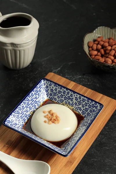 Tofu Pudding or Jimami Tofu, Okinawa Japan Traditional Food. Sprinkle with CHopped Nuts on Dofu Pudding