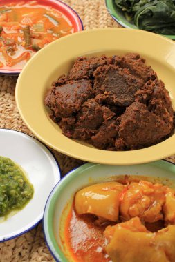 Selected Focus Rendang or Randang is The Most Delicious Food in the World. Made from Beef Stew and Coconut Milk with Various Herbs and SPice. Typically food from Minang Tribe, West Sumatera, Indonesia