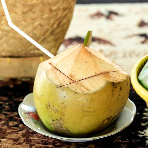 Es Kelapa Muda or Young Coconut Ice is Traditional Beverage in Indonesia, Fresh and Sweet. Served in Coconut Shell