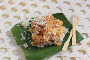 Close Up Sawut, Indonesian traditional Snack made from Steamed Shredded Cassava, Palm Sugar, and Coconut.