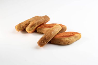 Selected Focus Pukis is a Popular Traditional Snack in Indonesia. This Snack is One Varian of Jajanan Pasar. COpy Space on White Background