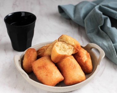 Pillow Bread or Odading is an Indonesian Street Food from Bandung, West Java. Roti Bantal Made from Flour, Egg, Milk, and Yeast
