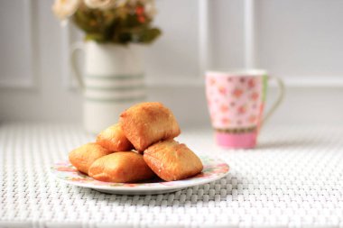 Pillow Bread or Odading is an Indonesian Street Food from Bandung, West Java. Roti Bantal Made from Flour, Egg, Milk, and Yeast
