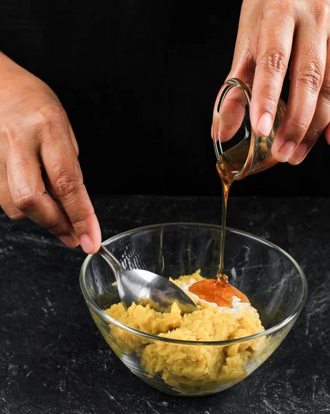 Pour Honey to the Cake Mixture in A Bowl, Baking process Step by Step in the Kitchen