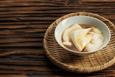 Tofu Pudding, Soy Milk Pudding or Wedang Tahu Tahwa, Served with Palm Sugar Syrup.