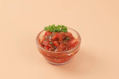 Tomato Salsa Dip Sauce on Glass Bowl, Isolated 