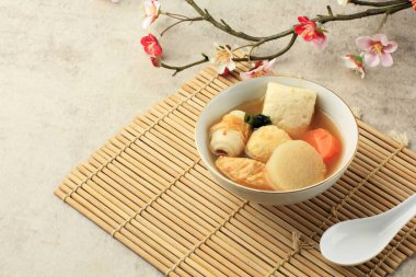 Japanese Oden, Fishcake Soup and Vegetable. One Portion on White Bowl. Copy Space for Text 