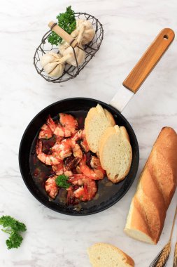 Selected Focus Top View Gambas Al Ajillo, Shrimp Cooked in Olive Oil, Chilli, and Garlic