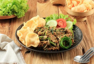 Lotek Bandung, Sundanese Traditional Healthy Salad Made from Various Boiled vegetable with Spicy Peanut Sauce. Usually Served wuth kerupuk and Eat with Steamed Rice  clipart