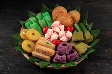 Jajan Pasar Tampah, Assorted Colorful Indonesian Traditional Cakes Served During Festivities clipart