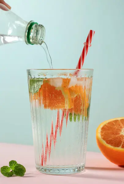 Summer Orange Cocktail Soda  with Fresh Citru and Mint Leaf.  Hard Seltzer, Lemonade, Refreshing Drinks, Low Alcohol Mocktails, Summer Drink Concept.