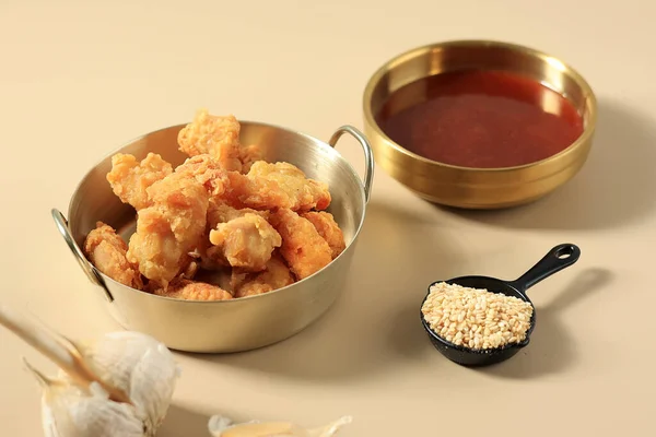 Crispy Popcorn Chicken with Korean Yangnyeom Sauce, Topping with Sesame Seed