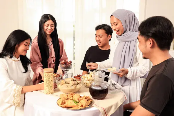 Friends Eat Dinner at Ramadhan Holy Month for Breaking the Fast, Buka Bersama or Bukber Concept
