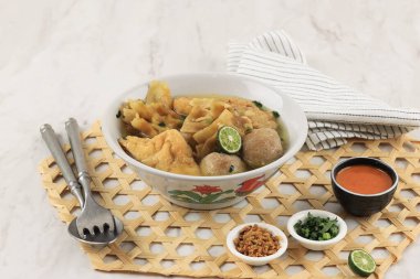 Baso Cuanki Bandung, Meatball and Batagor in Stock Soup. Popular Street Food from West Java, Indonesia.