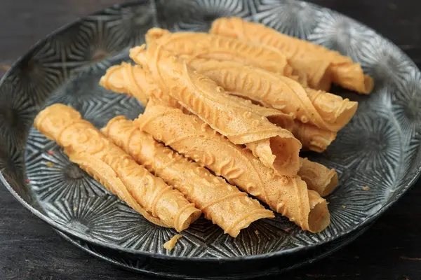 stock image Kue Semprong or Indonesian Egg Roll with Ginger Aroma. Traditional Snack Made from Rice Flour, Sugar, and Coconut Milk 