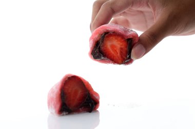 Take Half Sliced Ichigo Strawberry Japanese Mochi, on White Table  clipart