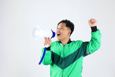 Indonesian Online Driver Grab Gojek Holding Megaphone Making Fist Hand, on White Background  clipart