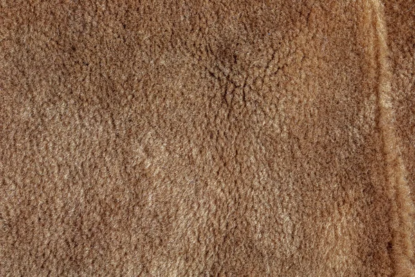 软毛米色地毯的背景图 羊毛羊绒毛特写纹理背景 顶部视图 — 图库照片