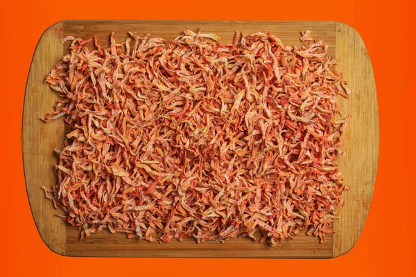 Organic Dehydrated Carrots. Freeze Dried Carrot Pieces. Air Dried Vegetables Dehydrated Carrot Slice Flakes Granules. Carrot background.