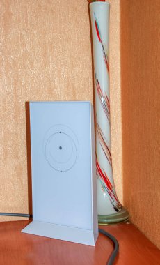 Terminal located in an apartment from a Starlink satellite dish, an Internet constellation controlled by SpaceX, mounted on the wall of an apartment building.