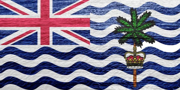 Flag of the British Overseas Territory of British Indian Ocean Territory on a textured background. Concept collage.