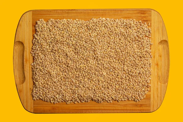 Pearl barley background close-up, top view. Pearl barley closeup, grain texture, top view. Pearl barley is processed barley grains that have been processed.