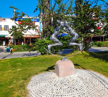 BODRUM, TURKEY - October 8, 2021: Sculpture on the embankment of the city on the coast of the Aegean Sea. Travel and tourism concept, luxury vacation.