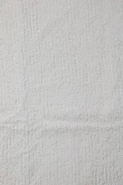 The texture of a light beige bath towel with a large volume