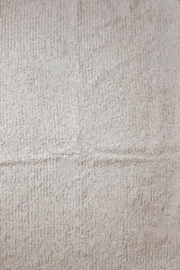 Realistic illustration of the texture of a light beige bath towel with a large volume