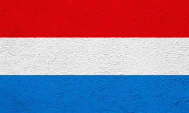 Kumaşlı arka planda Lüksemburg bayrağı. Kavram kolajı.