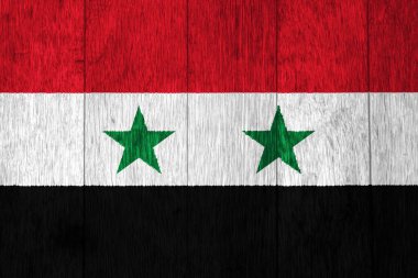 Suriye Arap Cumhuriyeti bayrağı dokulu bir arka planda. Kavram kolajı.