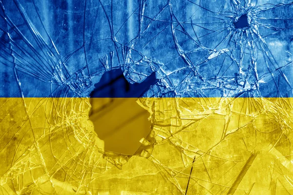 玻璃裂缝的黄蓝色背景 碎玻璃纹理上的乌克兰国旗 俄罗斯 乌克兰战争的概念 — 图库照片