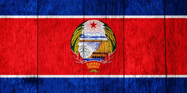具有纹理背景的朝鲜民主主义人民共和国或北朝鲜国旗 概念拼贴 — 图库照片