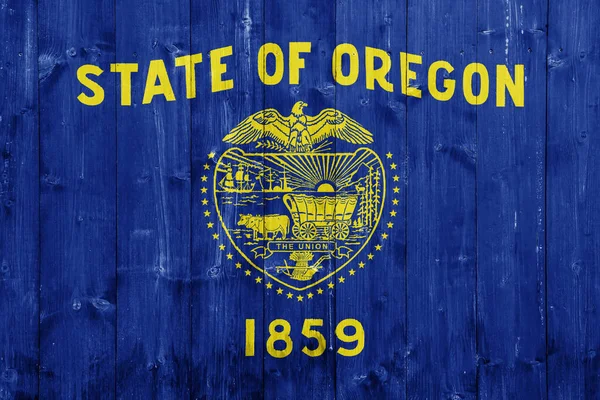 stock image Flag of USA state Oregon on a textured background. Concept collage.