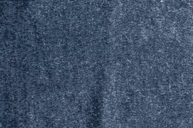 Mavi örgü kumaşının gerçekçi vektör çizimi. Soyut modern örgü dokusu mavi renkte. Koyu örülmüş arka plan