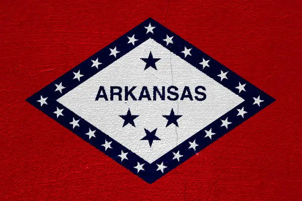 stock image Flag of Arkansas state USA flag on a textured background. Concept collage.