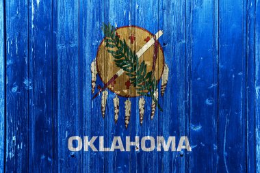 Oklahoma Eyaleti bayraklarının dokulu bir geçmişi var. Kavram kolajı.