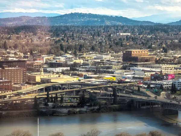 Views of Portland from a high point in the city. View from the window of the Portland City Grill seafood restaurant.