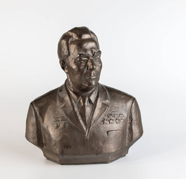 Dnepr, Ukraine - 02.24.2024: Bronze bust of L.I. Brezhnev. on a white background.