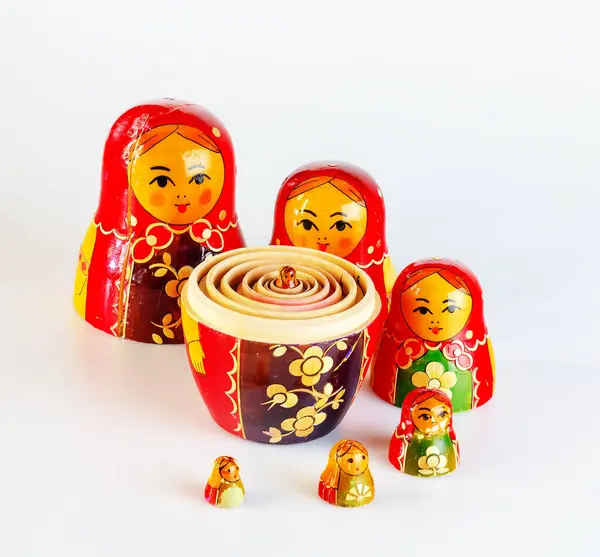 Matryoshka, a Russian wooden doll on a white background