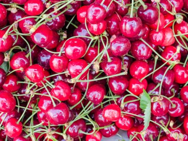 Arka plan olarak lezzetli olgun tatlı kiraz, üst görünümü.