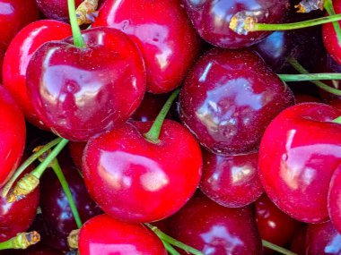 Arka plan olarak lezzetli olgun tatlı kiraz, üst görünümü.