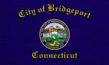 Kumaş dokusunun arka planında Chula Bridgeport, Connecticut bayrağı. Kavramsal kolaj.