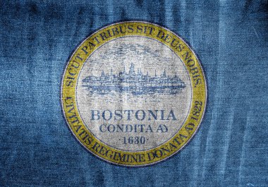 Boston, Massachusetts, ABD bayrağı, kumaş dokusunun arka planında. Kavramsal kolaj.