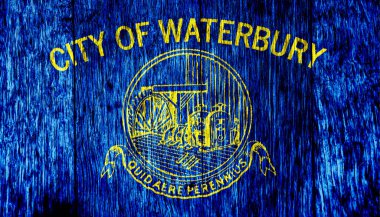 Flag of the city of Waterbury, Connecticut, USA, on a background of a wooden fence. Conceptual collage. clipart