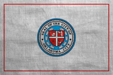Oklahoma City, Oklahoma, ABD bayrağı kumaş dokusunun arka planında. Kavramsal kolaj.