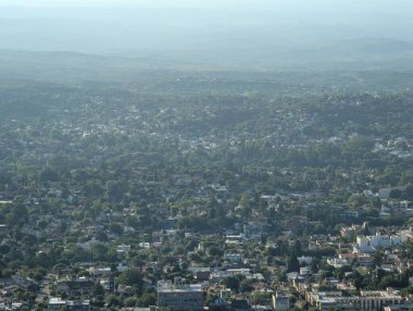 View of the urban development of Villa Carlos Paz in central Argentina. View from Altas Cumbres. clipart