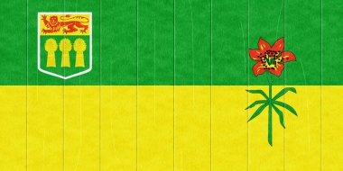 Saskatchewan eyaletinin resmi bayrağı. Kanada mı? Ahşap doku üzerine kavramsal kolaj.