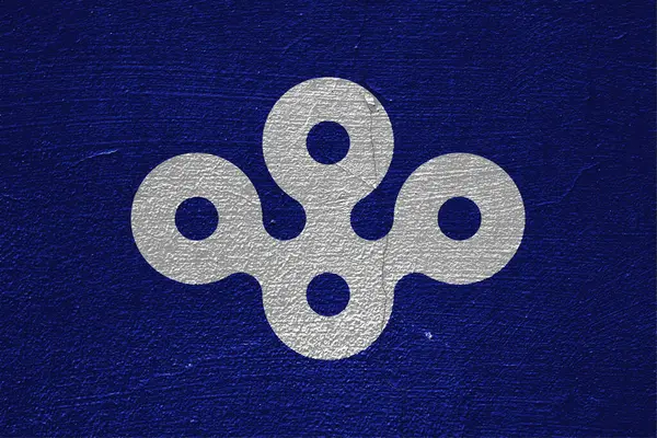 Osaka 'nın resmi bayrağı. Japonya 'da il. Çatlak bir duvarın dokusunda kavramsal kolaj.