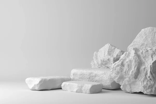 Abstrakte Weiße Farbe Geometrische Stein Und Felsenform Hintergrund Vitrine Für lizenzfreie Stockfotos